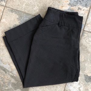 Black pinstriped cuffed wide leg capri pants.